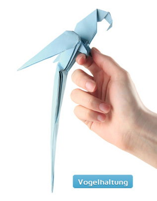Papiervogel auf Hand